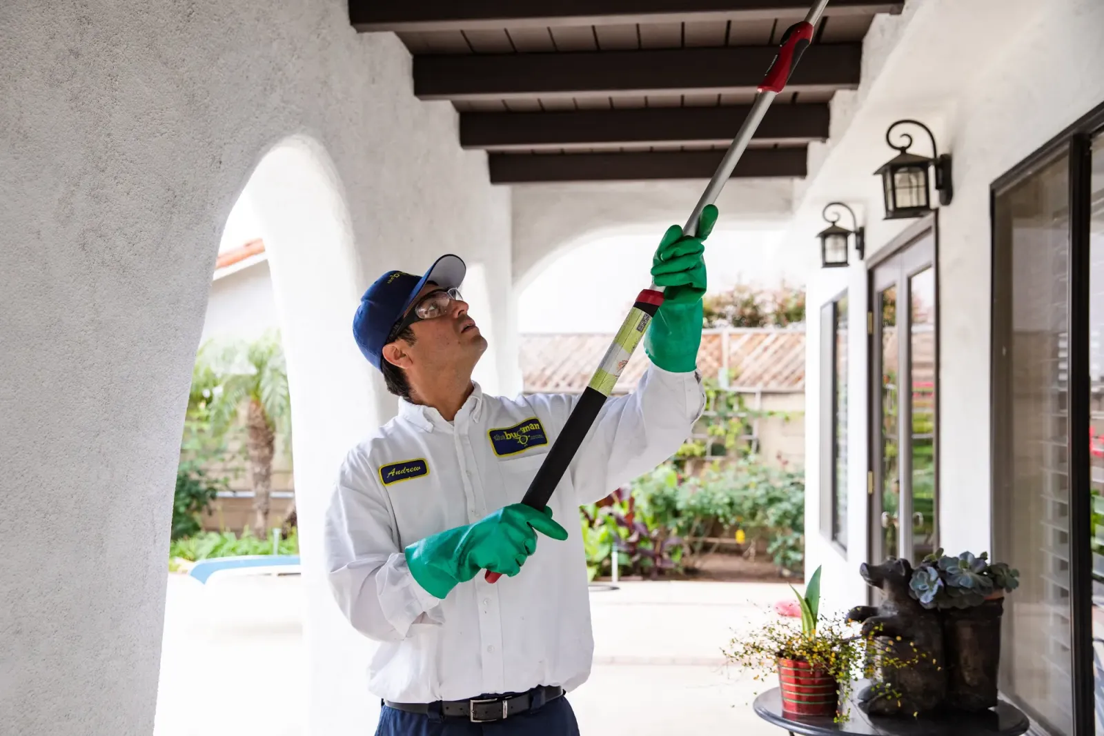 the bugman exterminator servicing a home
